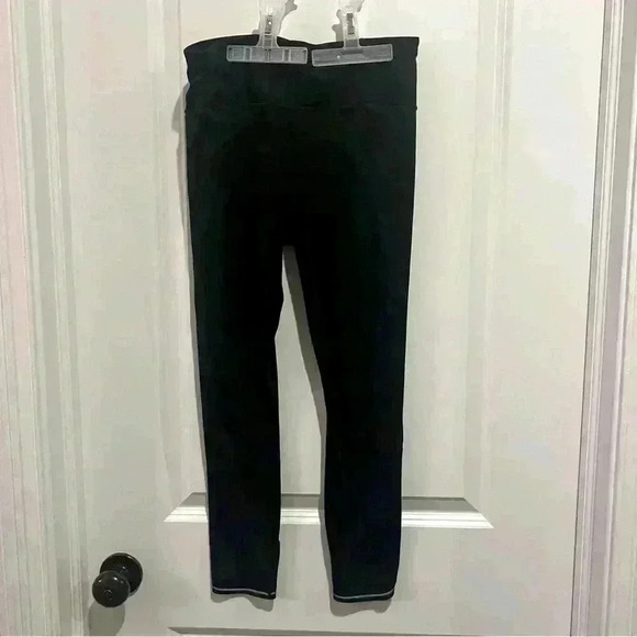 Athleta Pants - Athleta‎ leggings with reflective strips on the bottom Size S